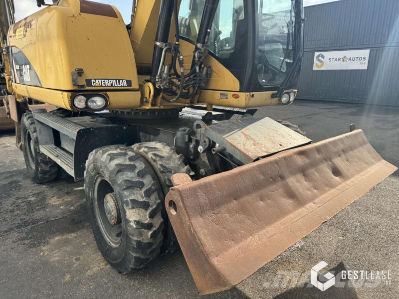 CAT M313D Колесни екскаватори