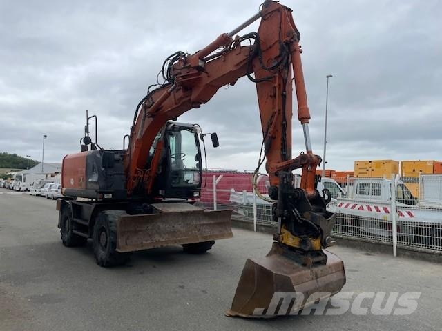 Hitachi ZX140W-5B حفارات بعجل