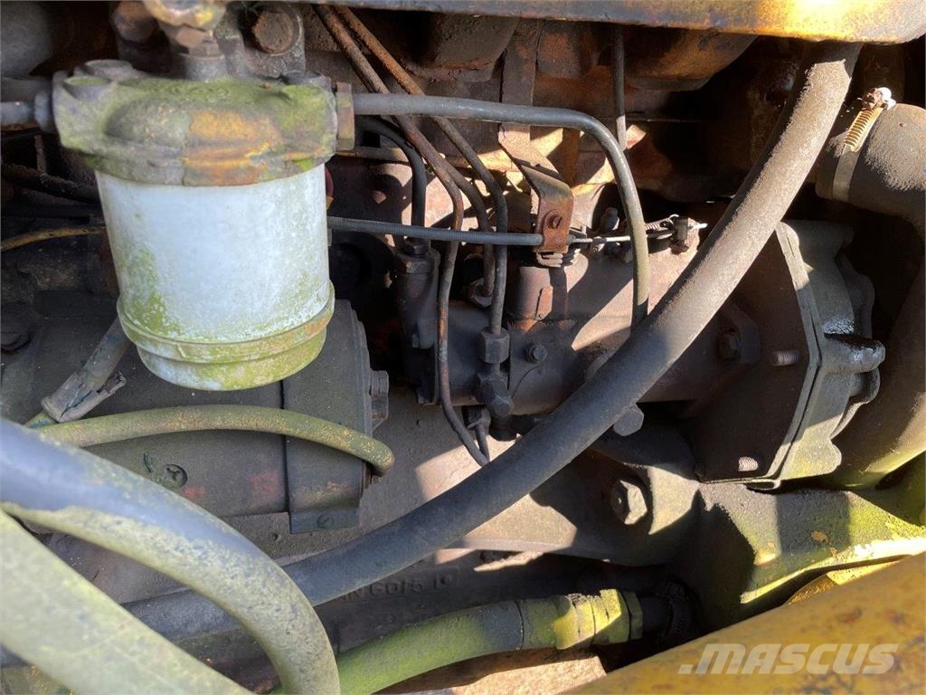 Ford 4550 rendegraver - til ophug لوادر ذات جرافات عكسية