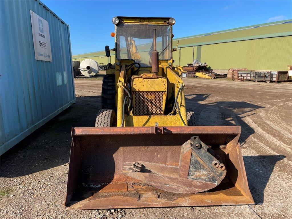 Ford 4550 rendegraver - til ophug لوادر ذات جرافات عكسية