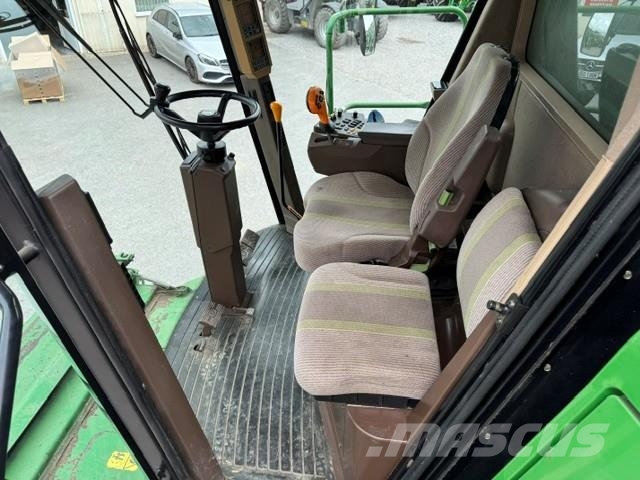 John Deere C670 Комбайни
