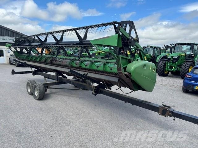 John Deere C670 Комбайни