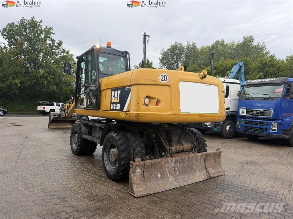 CAT M318D Schnellwechsler Schwenkfunktion OilQuick OQ7 Wheeled excavators