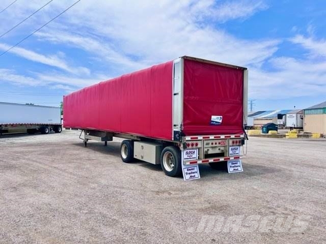 East Mfg Flatbed with Rolling Tarp System Flatbed/Dropside trailers