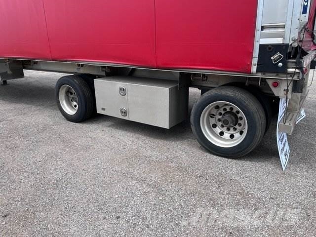 East Mfg Flatbed with Rolling Tarp System Flatbed/Dropside trailers