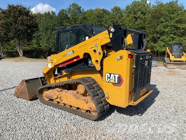 CAT 265 Lietoti riteņu kompaktiekrāvēji