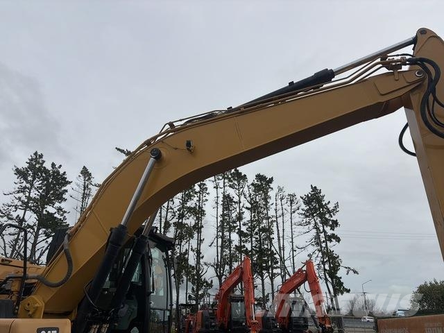 CAT 323 Beltegraver