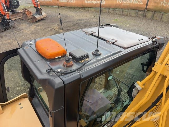 CAT 323 Beltegraver