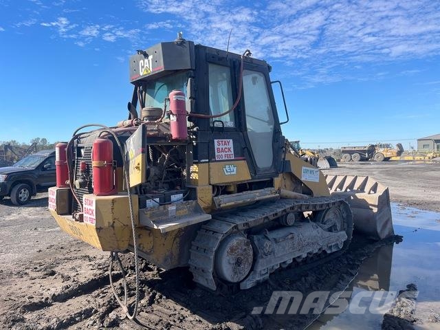 CAT 953C Гусеничні вантажники