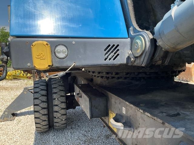Fuchs MHL335 Stroje pre manipuláciu s odpadom