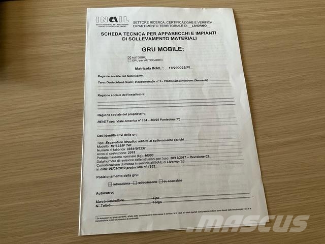 Fuchs MHL335 Stroje pre manipuláciu s odpadom