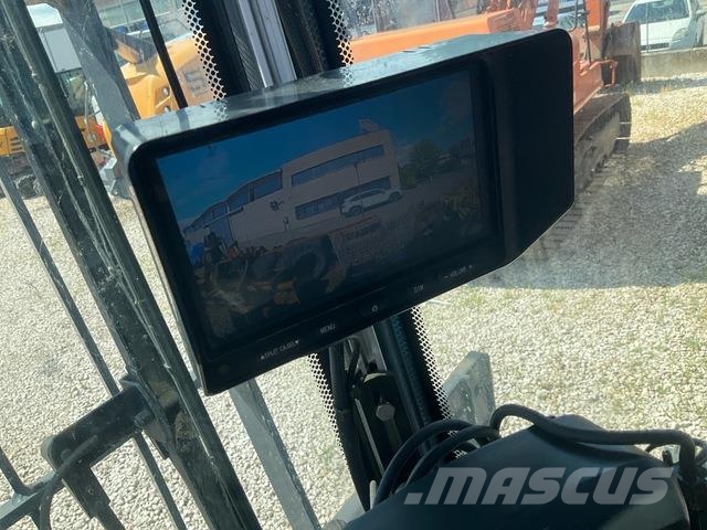 Fuchs MHL335 Stroje pre manipuláciu s odpadom