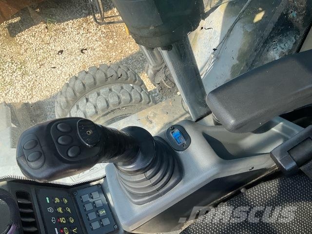 Fuchs MHL335 Stroje pre manipuláciu s odpadom