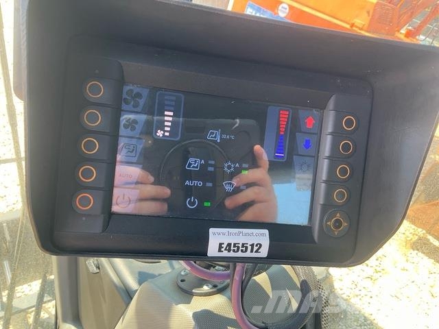 Fuchs MHL335 Stroje pre manipuláciu s odpadom