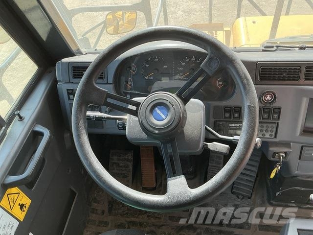 Komatsu HD325-7 Σπαστό Dump Truck ADT