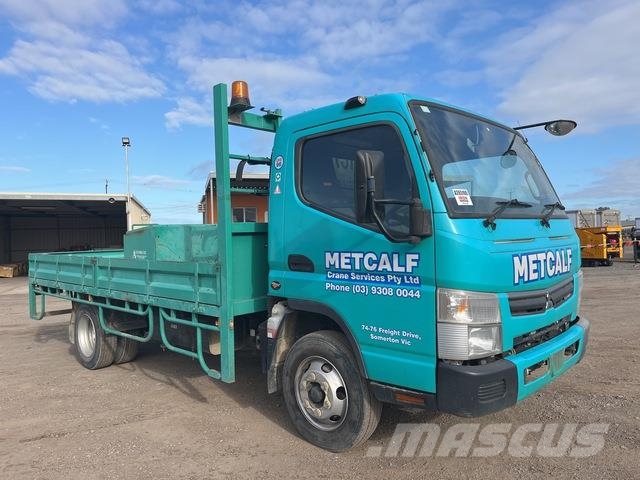 Mitsubishi Fuso Canter 7/800 شاحنات مسطحة/مفصلية الجوانب