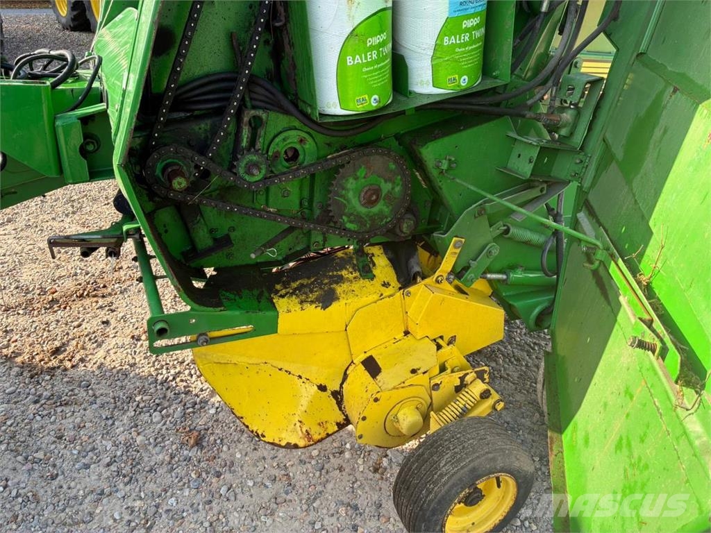 John Deere 590 Ronde-balenpersen