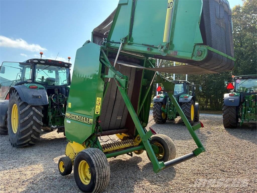 John Deere 590 Ronde-balenpersen