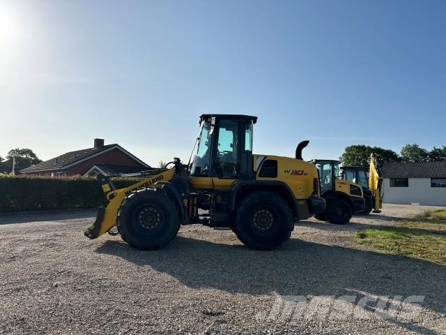New Holland W 110D GUMMIHJULSLÆS لوادر بعجل
