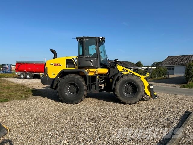 New Holland W 110D GUMMIHJULSLÆS لوادر بعجل