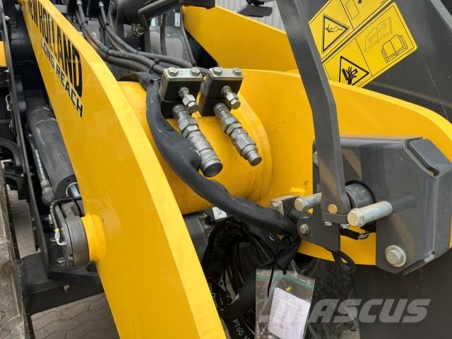 New Holland W 110D GUMMIHJULSLÆS لوادر بعجل
