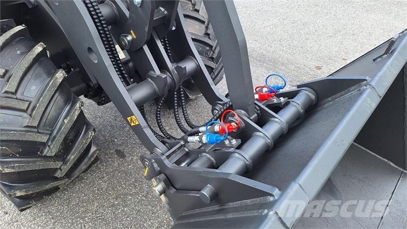 Eurotrac W12S mellem tårn لوادر صغيرة