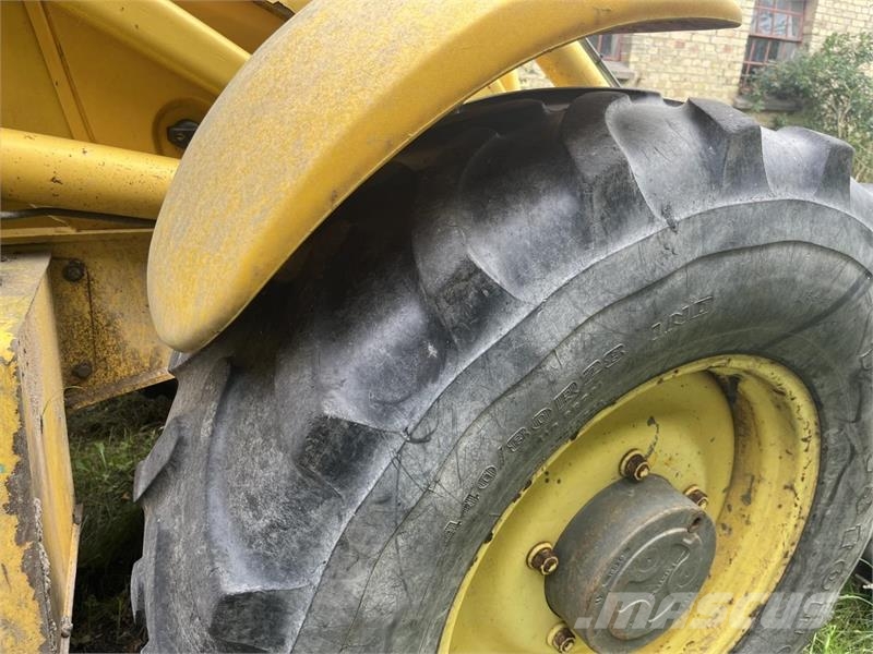 New Holland LB 115 PS Экскаваторы-погрузчики