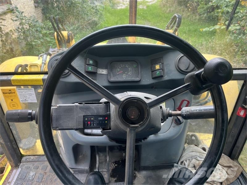 New Holland LB 115 PS Экскаваторы-погрузчики