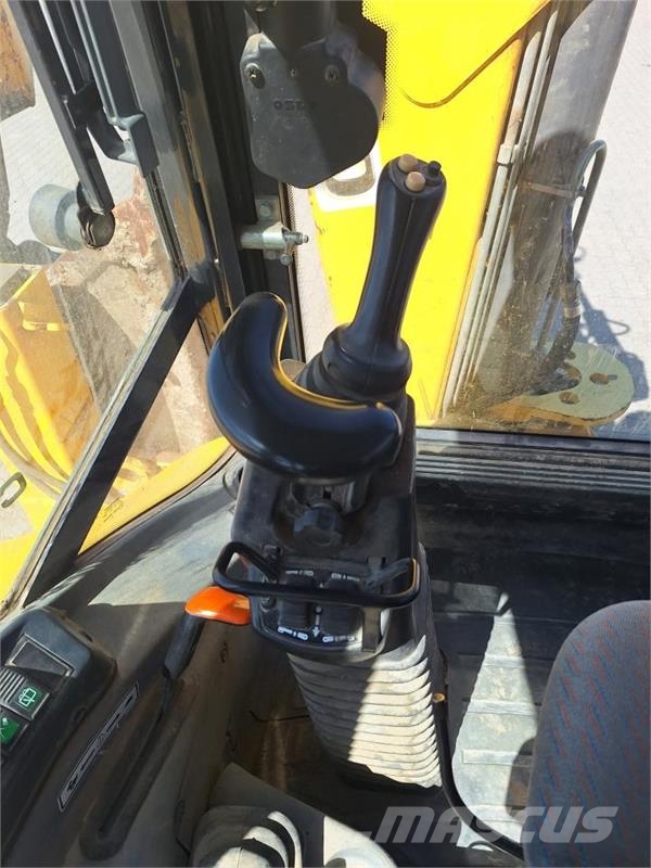 New Holland LB 115B SS Екскаватори-навантажувачі