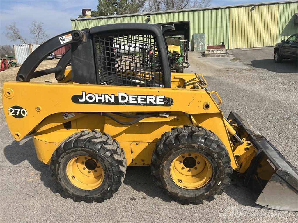 John Deere 270 Lietoti riteņu kompaktiekrāvēji