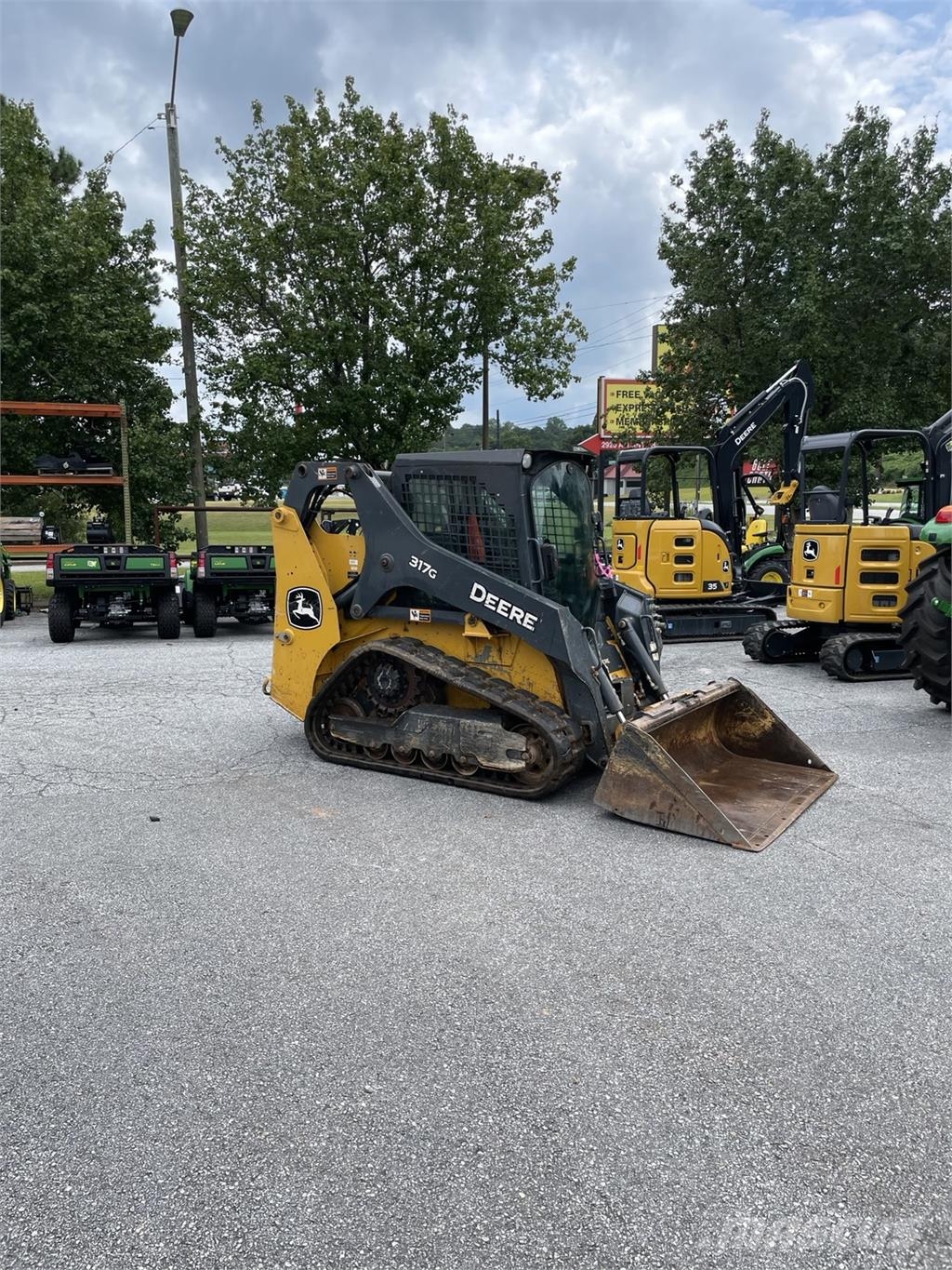 John Deere 317G Малі навантажувачі