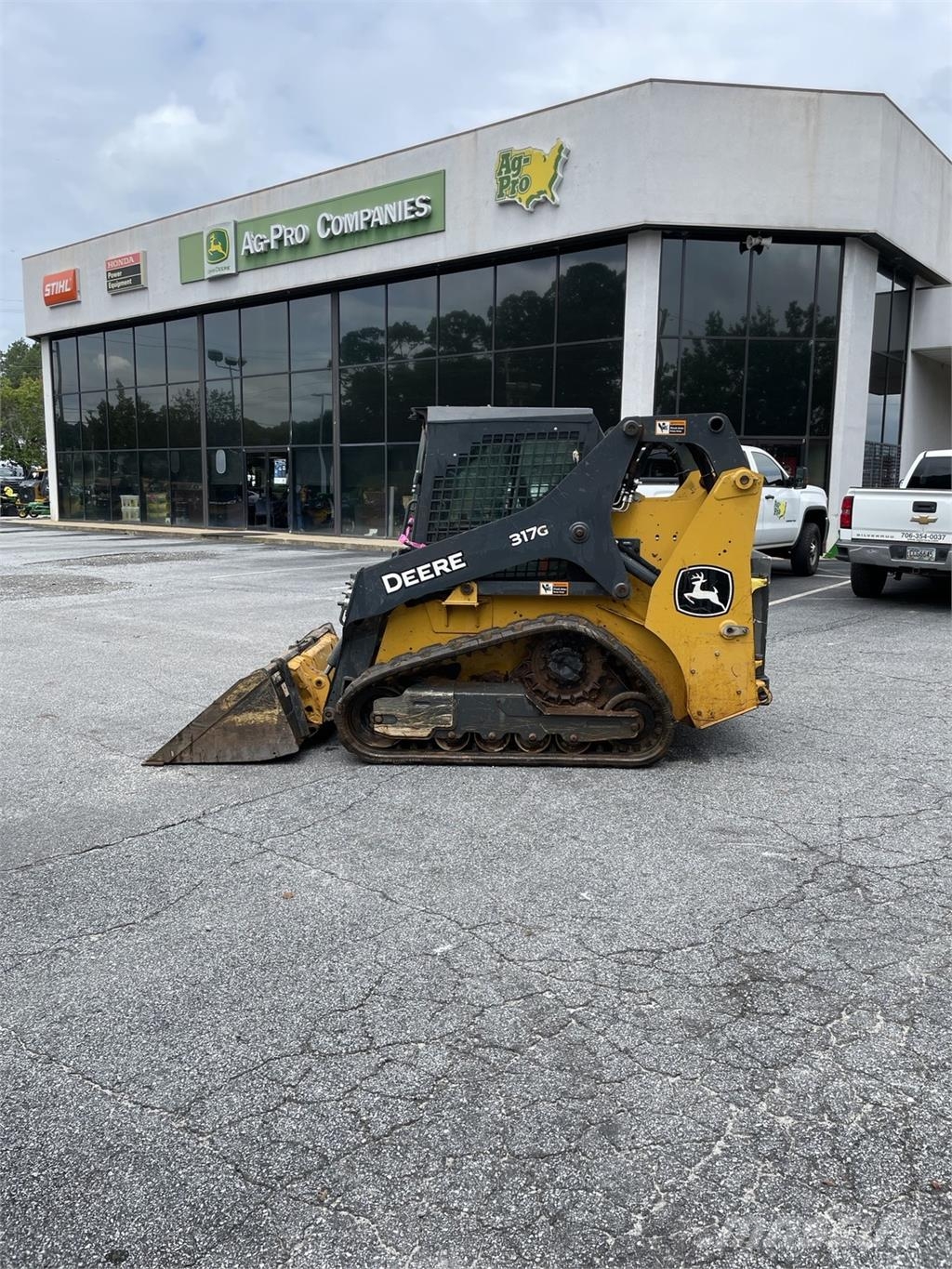John Deere 317G Малі навантажувачі
