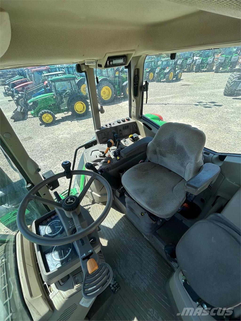 John Deere 6195M Tractors