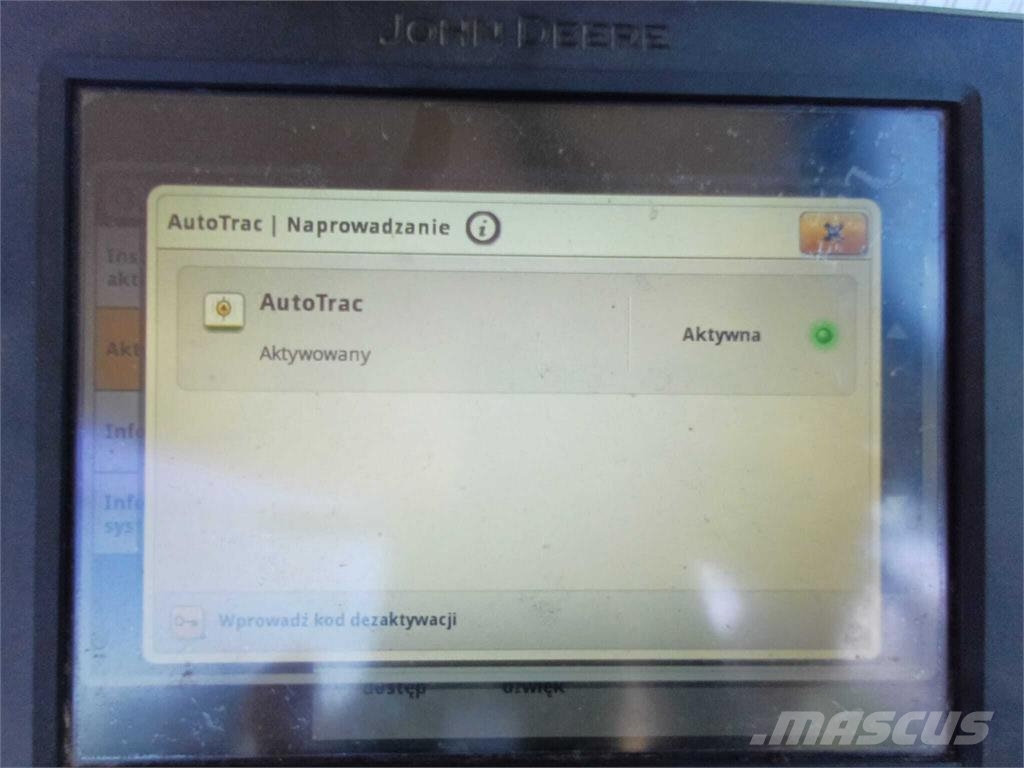 John Deere 6215R الجرارات
