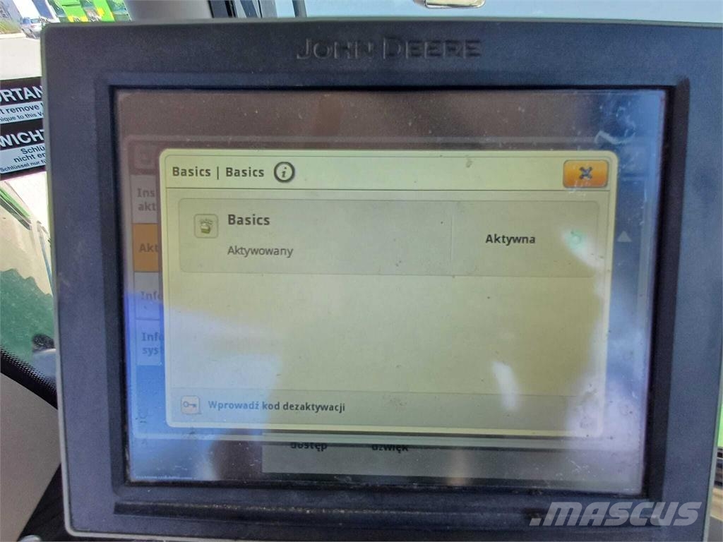 John Deere 6215R الجرارات
