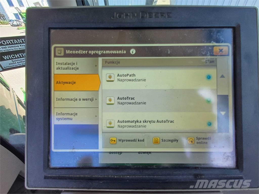 John Deere 6215R الجرارات