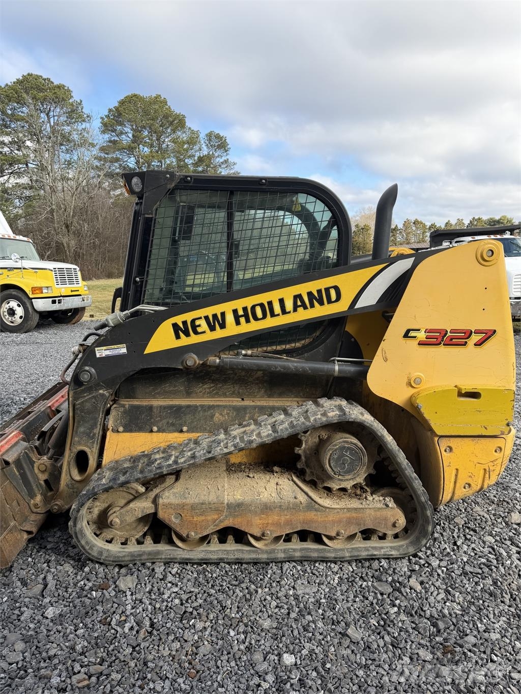 New Holland C327 Minicargadoras