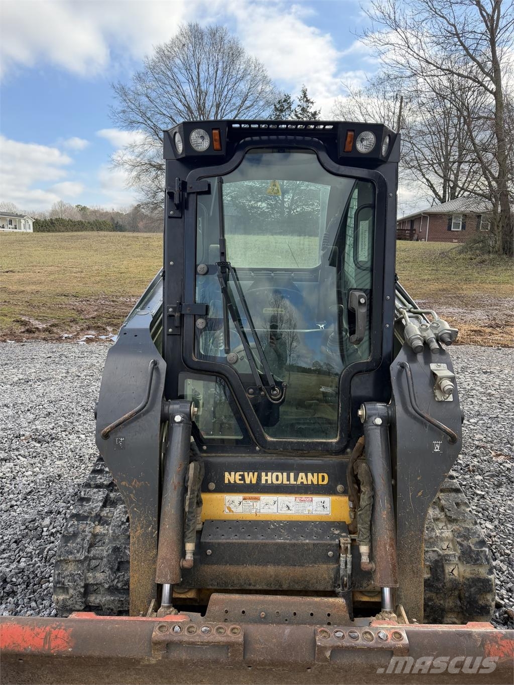 New Holland C327 Minicargadoras