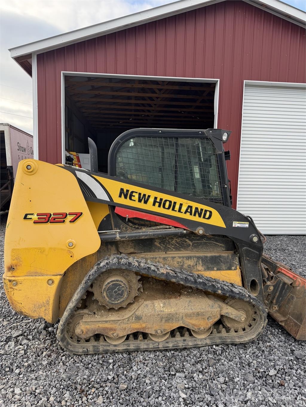 New Holland C327 Minicargadoras