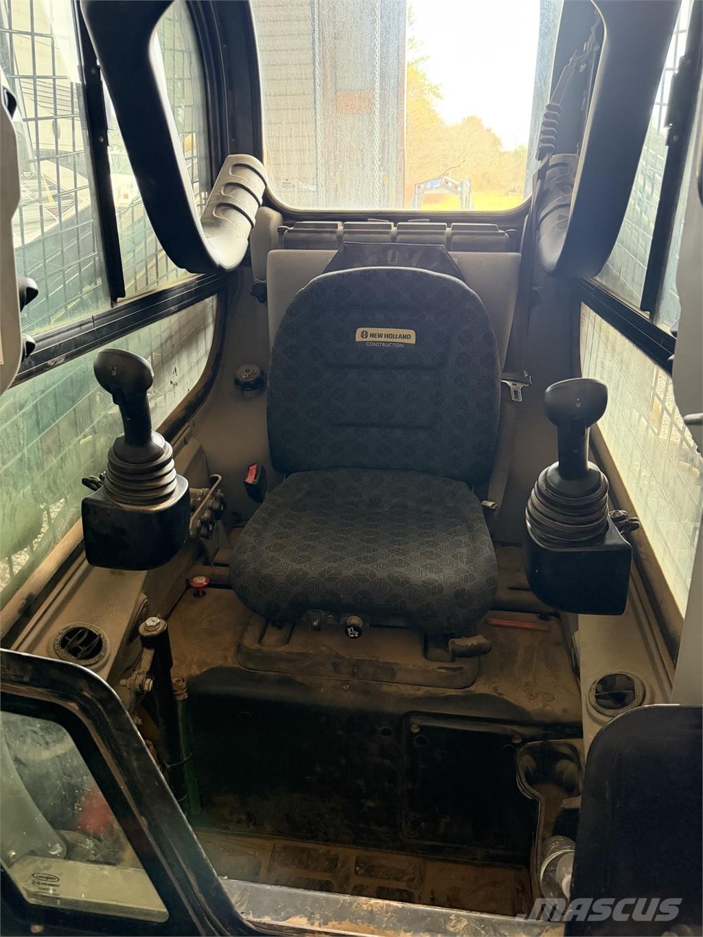 New Holland C327 Minicargadoras
