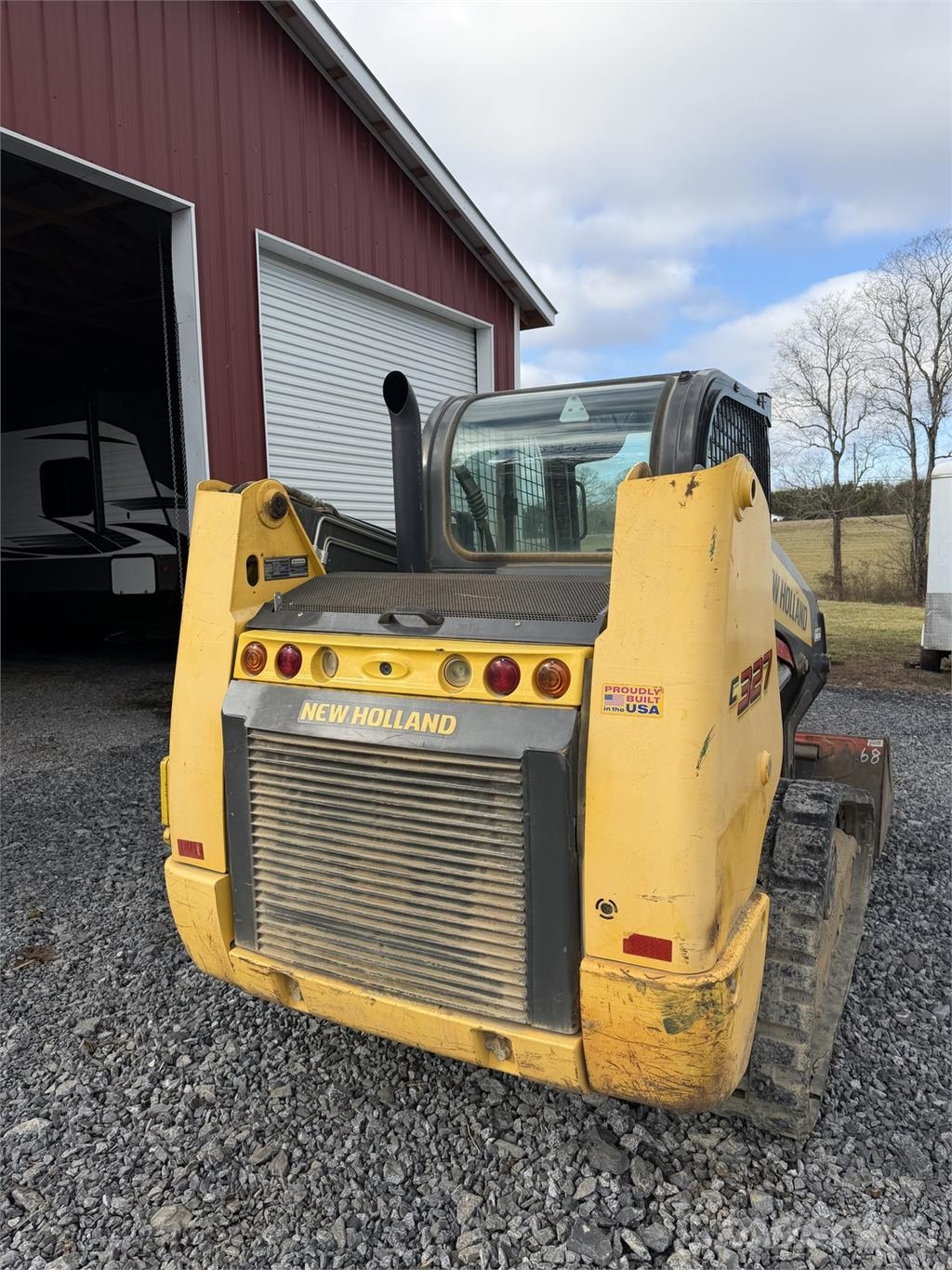 New Holland C327 Minicargadoras