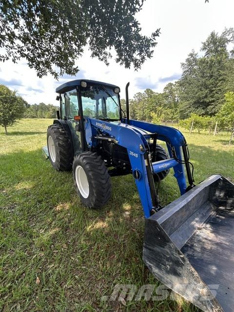 New Holland TN65D الجرارات