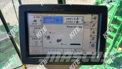 John Deere T550 Kombajni