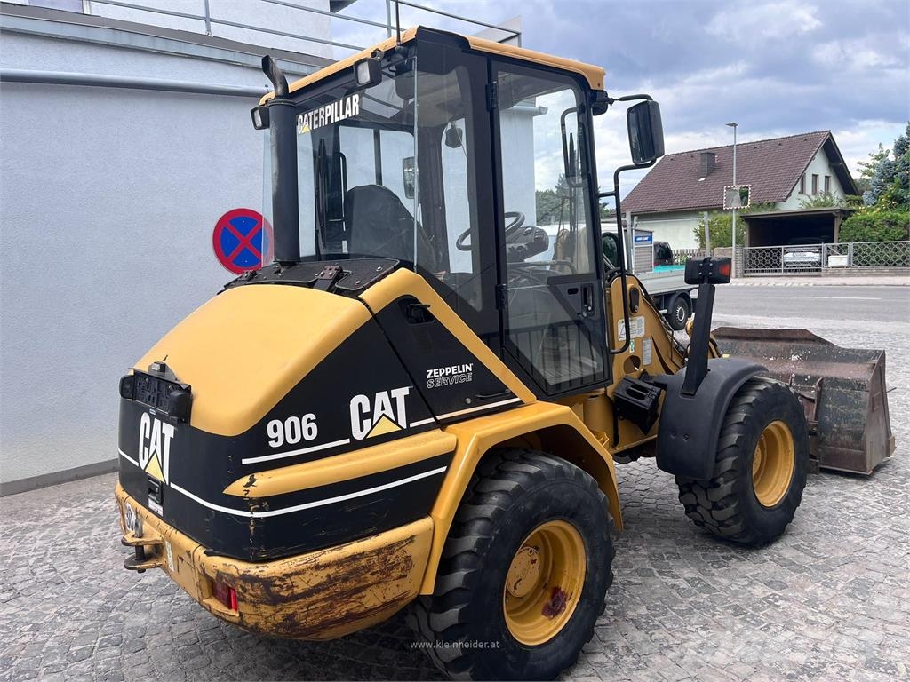 CAT 906 لوادر بعجل