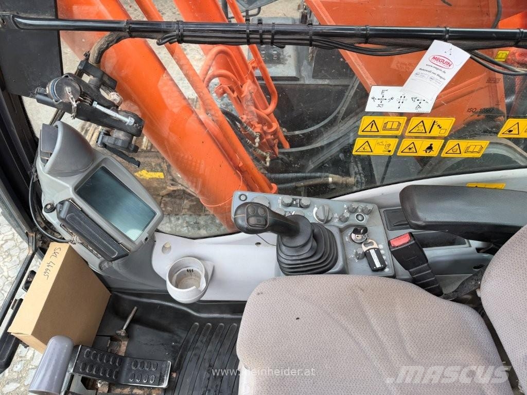 Hitachi ZX 210 LC-6 Beltegraver