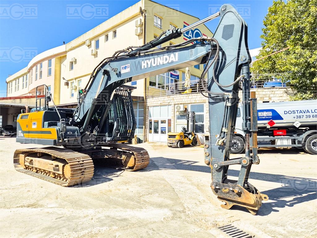 Hyundai HX220L Гусеничні екскаватори