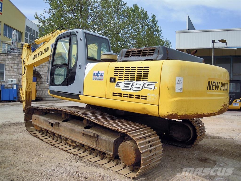 New Holland E 385 Bageri guseničari