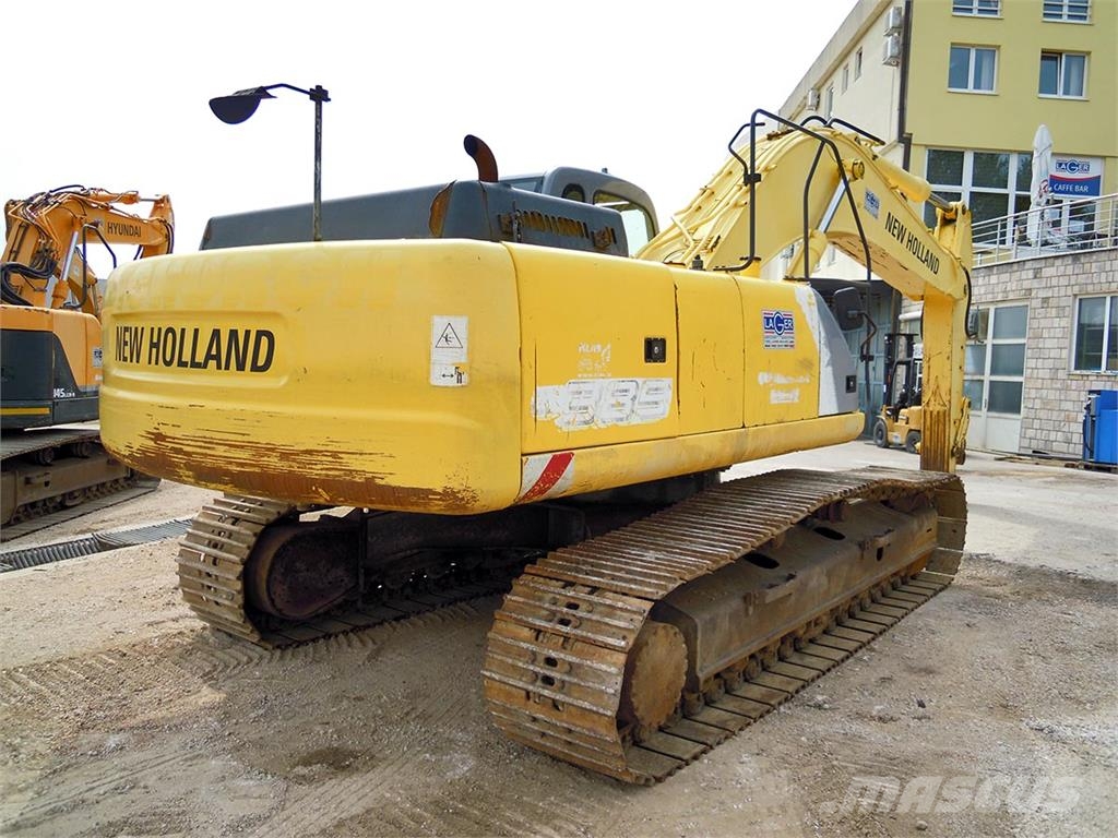 New Holland E 385 Bageri guseničari