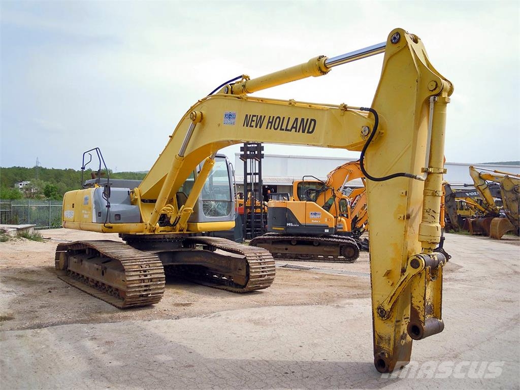 New Holland E 385 Bageri guseničari