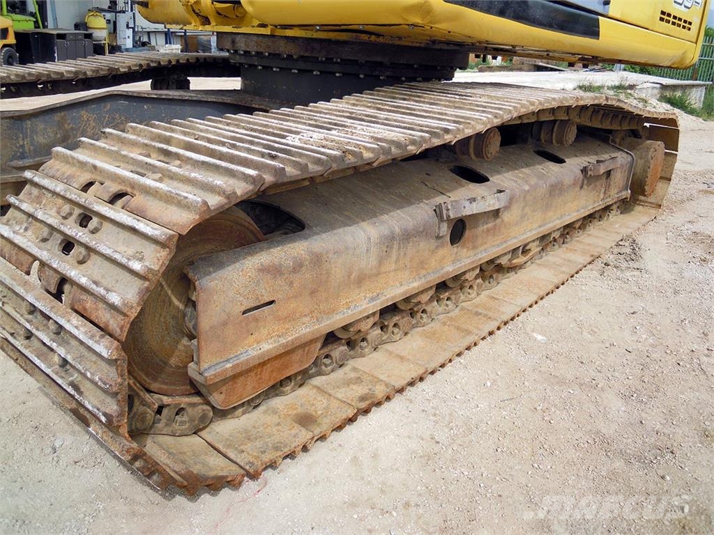 New Holland E 385 Bageri guseničari